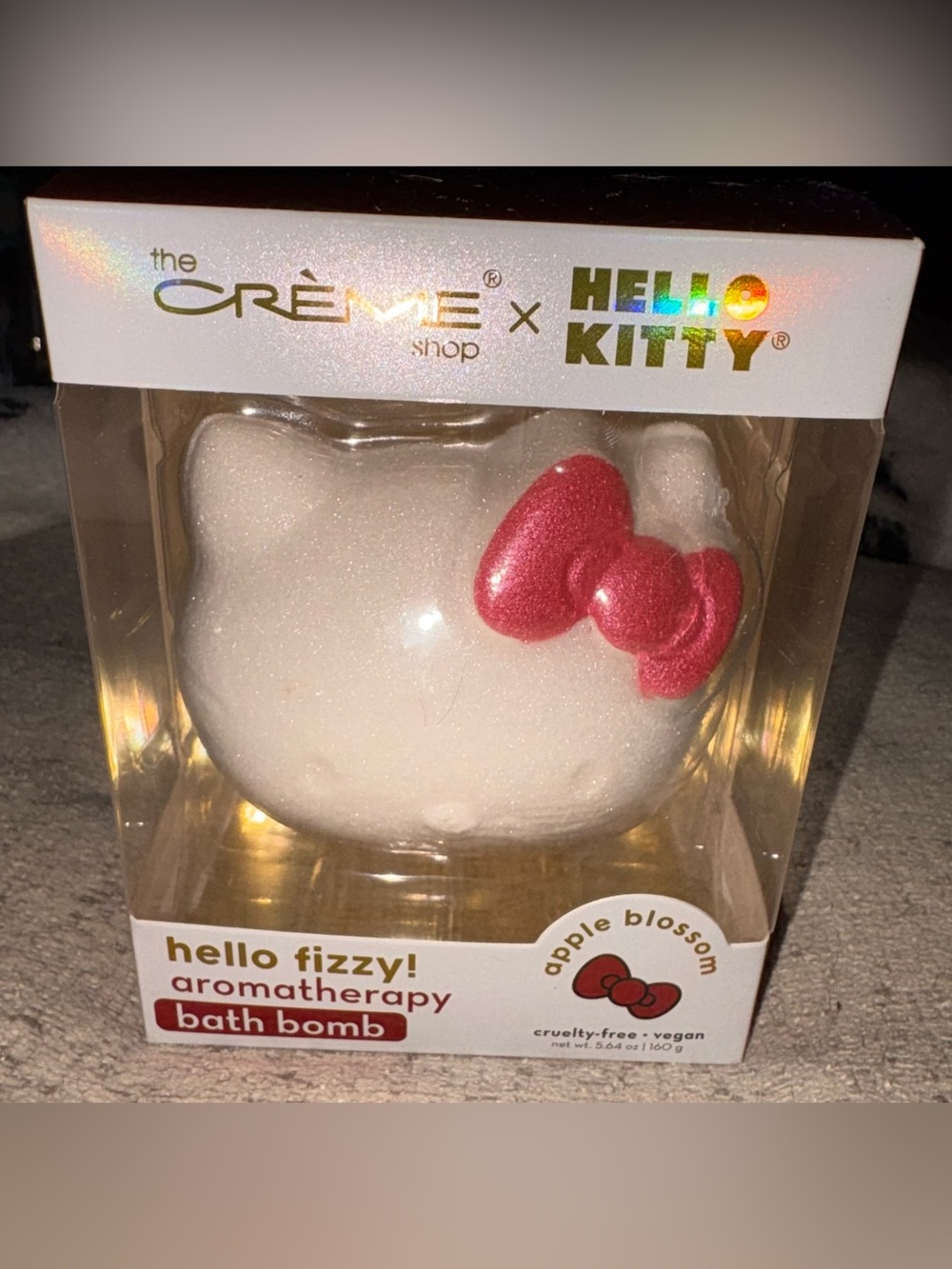 The Crème Shop x Hello Kitty Fizzy Apple Blossom Bath Bomb - White with Red Bow